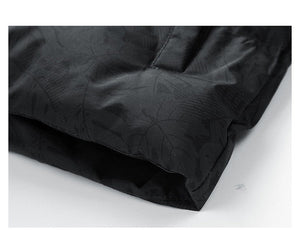 ZURICH BOMBER — Oversized Hooded Puffer with Botanical Print