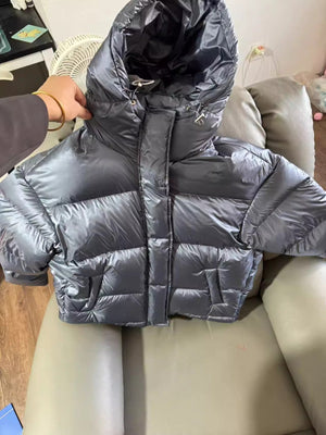 BOSTON PUFFER — Oversized Hooded Down Jacket with Snap Details